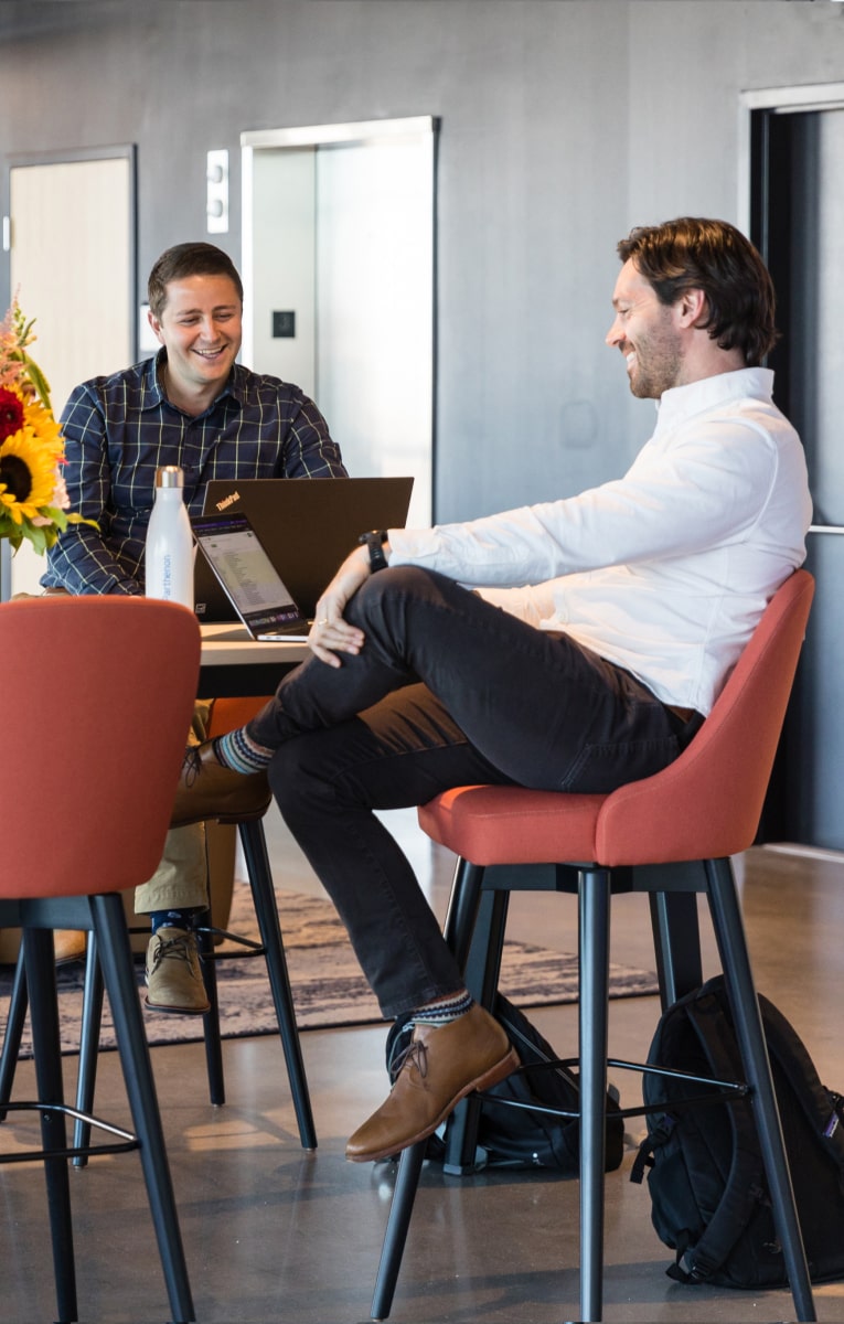 Employees talking at work