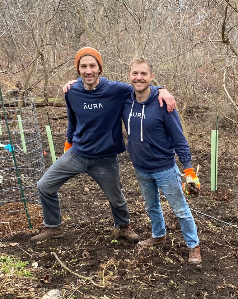 Aura teammates planting trees.