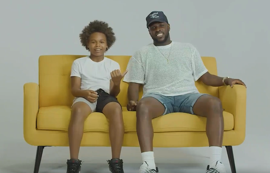 Father and son on couch