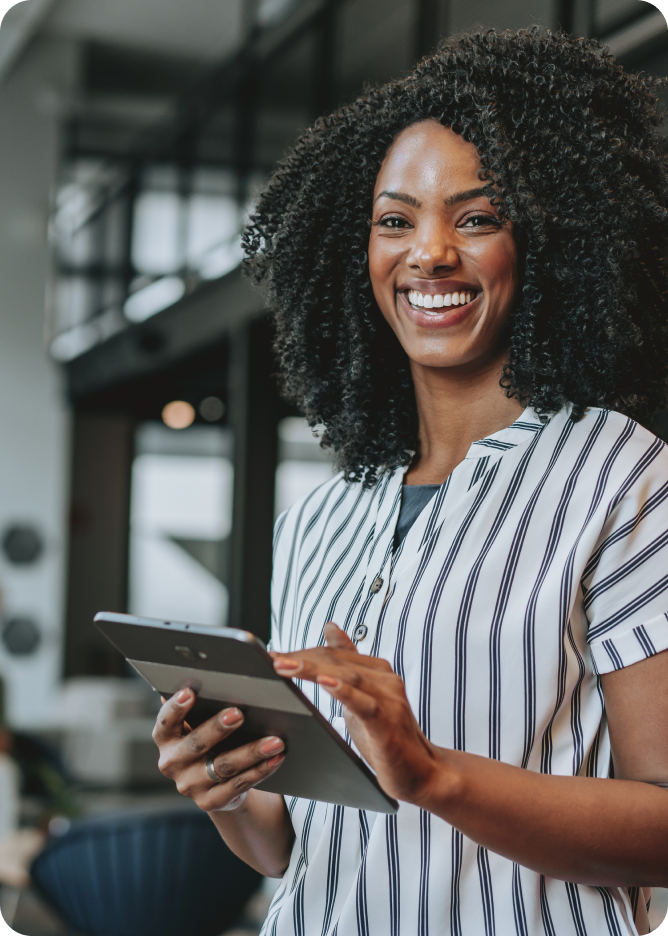 Smiling woman with tablet